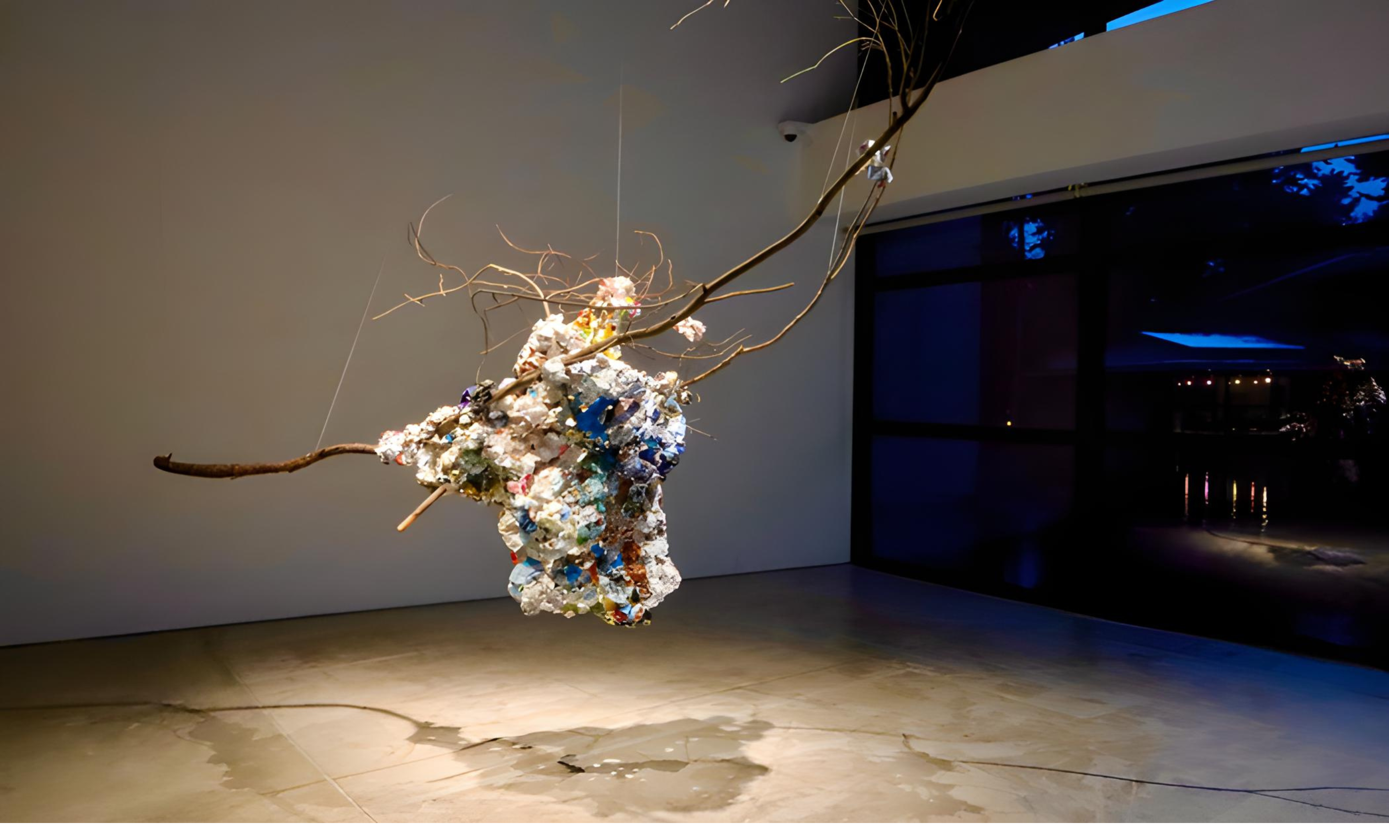 Maggie Chu, Nesting in the Woods, 2025, assemblage of tree branches, printed paper and fabric origami soft sculpture, 1.5 x 1.1 x 0.6 m. Courtesy of the artist